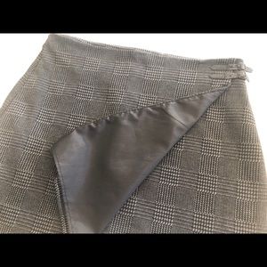 Cute “boot” wrap skirt with leather buckle detail